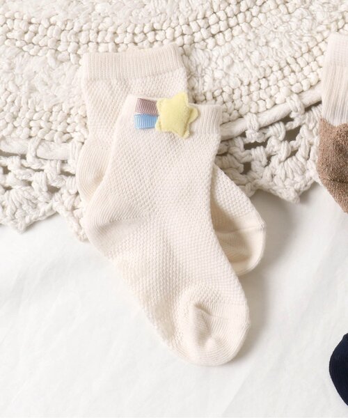 apres les cours（アプレレクール）の「星モチーフベビーソックス（ベビーシューズ/ベビーソックス・キッズ・ネイビー/アイボリー・9/12）」の2枚目の写真
