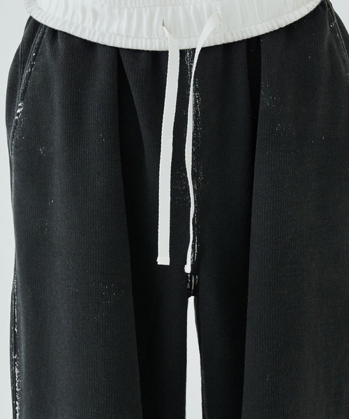 JOHN LAWRENCE SULLIVAN（ジョンローレンスサリバン）の「STUDIOUS別注 PAINTED SWEAT PANTS（スウェットパンツ・メンズ・ブラック・M/S）」の10枚目の写真
