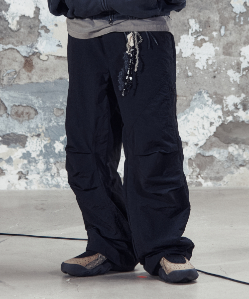 NODE LABS(ノードラボ)の「DEV:7 ナイロンパラシュートパンツ_ブラック(その他パンツ・レディース・その他・SMALL/MEDIUM/LARGE/X-LARGE)」の1枚目の写真