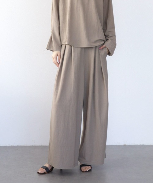 Jines(ジネス)の「ナチュラルスムースタックパンツ(その他パンツ・レディース・ブラック/ベージュ/ブルー/チャコールグレー・38)」の3枚目の写真