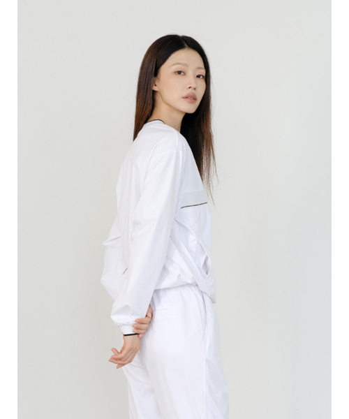 NITINA（ニティナ）の「防風 Vネック ウインドブレーカー WH（Tシャツ/カットソー・レディース・ホワイト・FREE）」の3枚目の写真