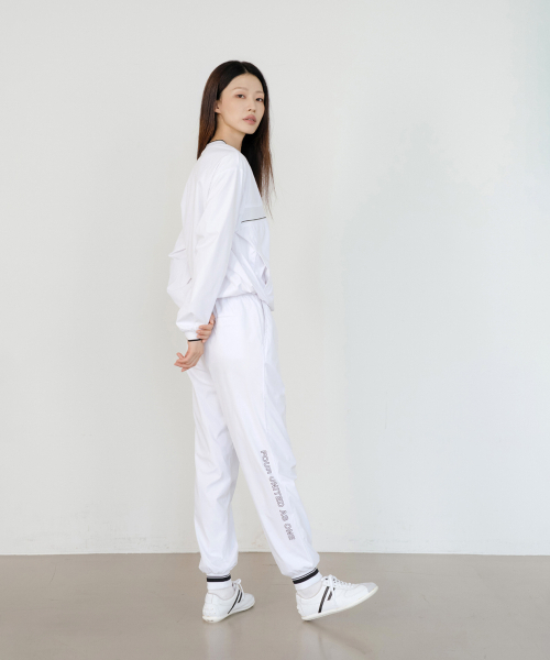 NITINA（ニティナ）の「防風 Vネック ウインドブレーカー WH（Tシャツ/カットソー・レディース・ホワイト・FREE）」の7枚目の写真