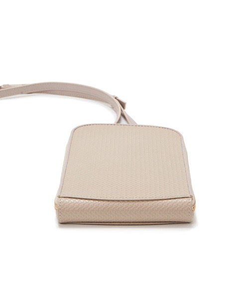 トプカピ/クロス 型押し パイピング ミニバッグ RAY レイ TOPKAPI（トプカピ）の「クロス 型押し パイピング ミニバッグ RAY