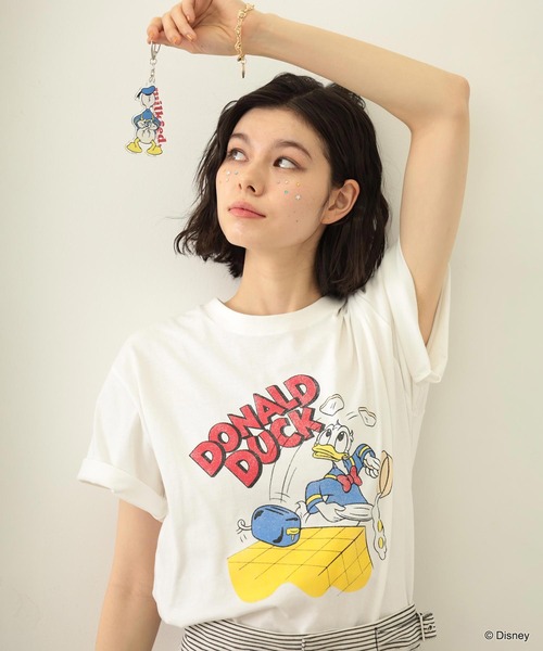 Disney(ディズニー)の「DONALD DUCK / COOKING S/S TEE(Tシャツ/カットソー・レディース・ライトブルー/ホワイト・ONE SIZE)」の9枚目の写真