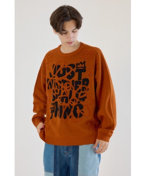 RODEO CROWNS WIDE BOWL（ロデオクラウンズワイドボウル）の「レタリングフラワーパイルニット（ニット/セーター・メンズ・オフホワイト/オレンジ/ブラック・MEDIUM/LARGE）」の3枚目の写真