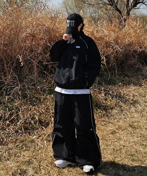GRAYBLVD(グレイブラバット)の「バスツパイピングウィンドブレーカー (ブラック)(ナイロンジャケット・レディース・その他・MEDIUM/LARGE)」の21枚目の写真