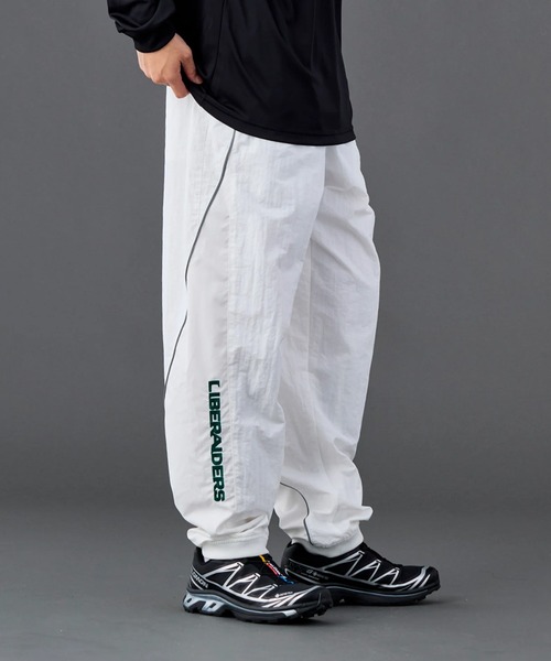 Liberaiders(リベレイダース)の「Liberaiders/リベレイダース LR NYLON PANTS ブランドロゴ イージーナイロンパンツ 秋 秋服 2026年秋冬(スウェットパンツ・メンズ・ネイビー/ブラック/ホワイト・L/XL/M/S)」の9枚目の写真