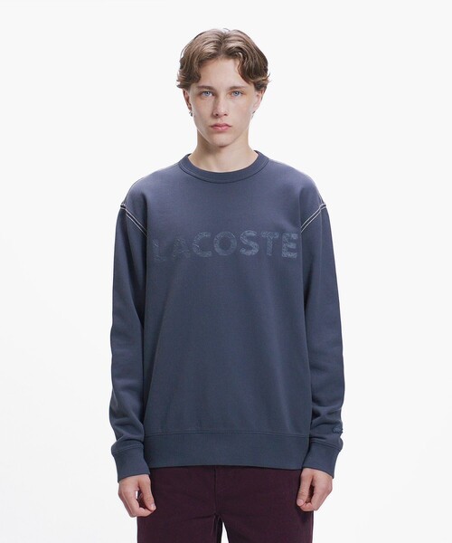 LACOSTE(ラコステ)の「エンザイムウォッシュ テクスチャーロゴ ヴィンテージクルーネックスウェット(スウェット・メンズ・イエロー/アイボリー/ダークグレー・4/3/2/5)」の5枚目の写真