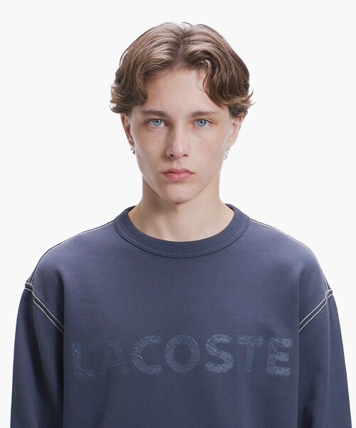 LACOSTE(ラコステ)の「エンザイムウォッシュ テクスチャーロゴ ヴィンテージクルーネックスウェット(スウェット・メンズ・イエロー/アイボリー/ダークグレー・4/3/2/5)」の7枚目の写真