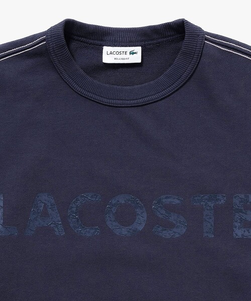 LACOSTE(ラコステ)の「エンザイムウォッシュ テクスチャーロゴ ヴィンテージクルーネックスウェット(スウェット・メンズ・イエロー/アイボリー/ダークグレー・4/3/2/5)」の13枚目の写真