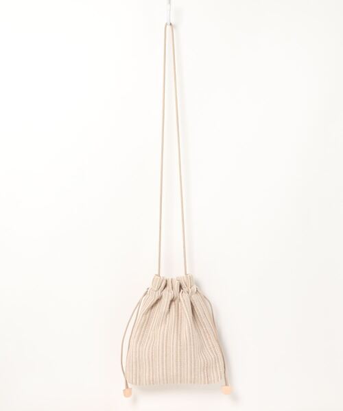 Lugnoncure(ルノンキュール)の「ストライプ巾着バッグ(ショルダーバッグ・レディース・ブラック/ベージュ・フリ-)」の1枚目の写真