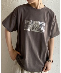 She's Closet（シーズクローゼット）の「オーバーサイズヴィンテージロゴ半袖メタリック箔プリントTシャツ（Tシャツ/カットソー）」