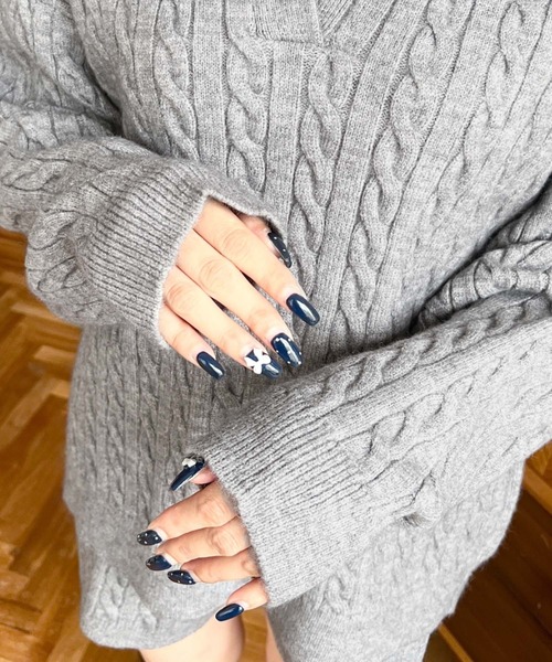 moment+（モーメントプラス）の「<セットアップ>ケーブル編みポロ