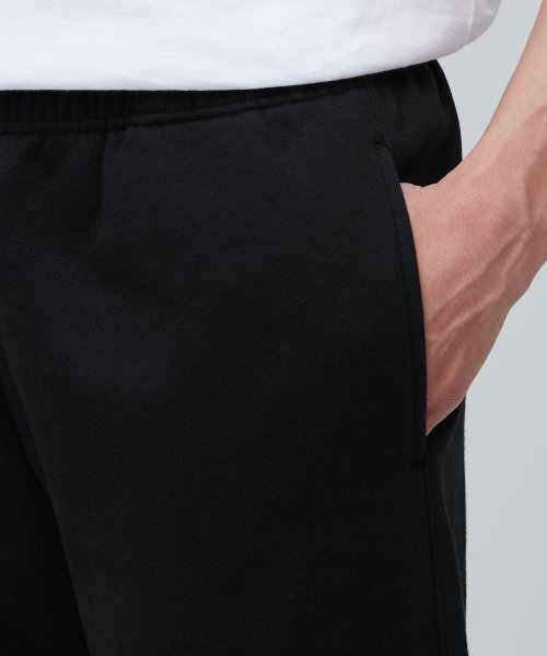 MUSINSA STANDARD(ムシンサスタンダード)の「フリース裏地のスウェットパンツ[黒(スウェットパンツ・メンズ・その他・SMALL/MEDIUM/LARGE/X-LARGE/XX-LARGE/XXX-LARGE)」の4枚目の写真