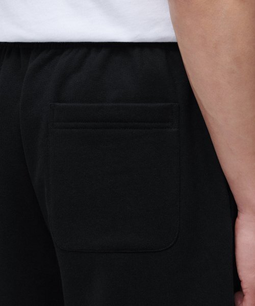 MUSINSA STANDARD(ムシンサスタンダード)の「フリース裏地のスウェットパンツ[黒(スウェットパンツ・メンズ・その他・SMALL/MEDIUM/LARGE/X-LARGE/XX-LARGE/XXX-LARGE)」の5枚目の写真