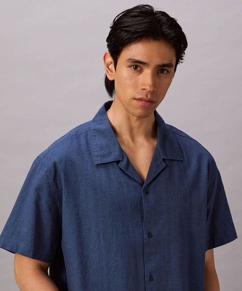 Calvin Klein(カルバン・クライン)の「ソリッドショートスリーブシャツ(シャツ/ブラウス・メンズ・ダークブルー/ホワイト・XL/S/M/L)」の6枚目の写真