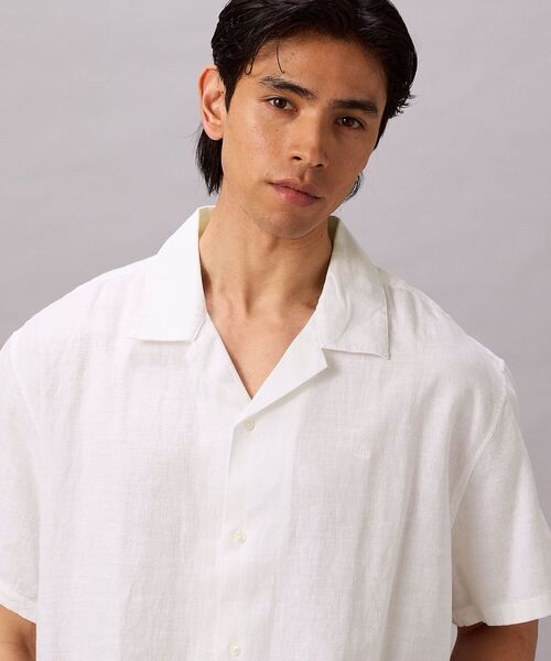 Calvin Klein(カルバン・クライン)の「ソリッドショートスリーブシャツ(シャツ/ブラウス・メンズ・ダークブルー/ホワイト・XL/S/M/L)」の8枚目の写真