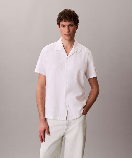 Calvin Klein(カルバン・クライン)の「ソリッドショートスリーブシャツ(シャツ/ブラウス・メンズ・ダークブルー/ホワイト・XL/S/M/L)」の10枚目の写真