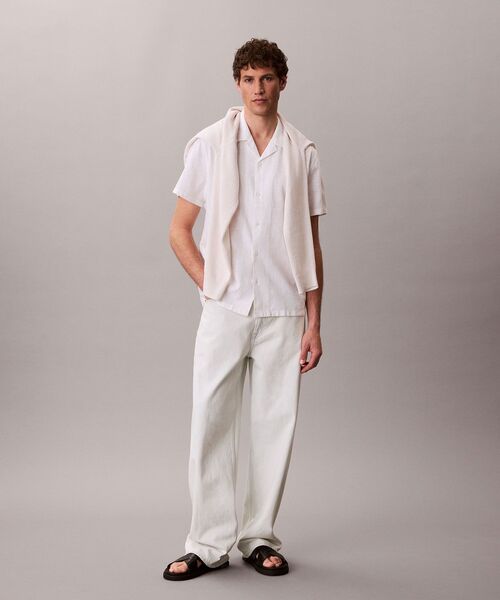 Calvin Klein(カルバン・クライン)の「ソリッドショートスリーブシャツ(シャツ/ブラウス・メンズ・ダークブルー/ホワイト・XL/S/M/L)」の12枚目の写真
