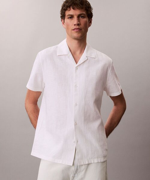 Calvin Klein(カルバン・クライン)の「ソリッドショートスリーブシャツ(シャツ/ブラウス・メンズ・ダークブルー/ホワイト・XL/S/M/L)」の13枚目の写真