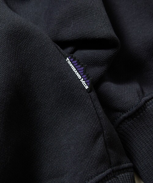 THOUSAND MILE(サウザンドマイル)の「THOUSAND MILE/サウザンドマイル 限定展開 THOUSAND MILE×FREAK'S STORE / サウザンドマイル 別注 クルーネック プルオーバー スウェット(スウェット・メンズ・ベージュ/チャコールグレー/ネイビー/アッシュグレー・SMALL/LARGE/MEDIUM)」の8枚目の写真
