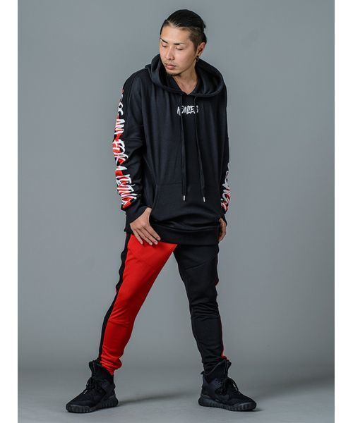 RE730（アールイーセブンサーティー）の「【RE730】左右配色切替えトラックパンツ  切り替えジャージサイドライン　ユニセックス（その他パンツ・メンズ・ブラック×ホワイト/ブラック×レッド・MEDIUM/LARGE/SMALL）」の7枚目の写真