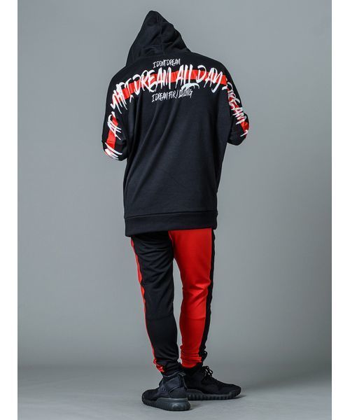 RE730（アールイーセブンサーティー）の「【RE730】左右配色切替えトラックパンツ  切り替えジャージサイドライン　ユニセックス（その他パンツ・メンズ・ブラック×ホワイト/ブラック×レッド・MEDIUM/LARGE/SMALL）」の8枚目の写真