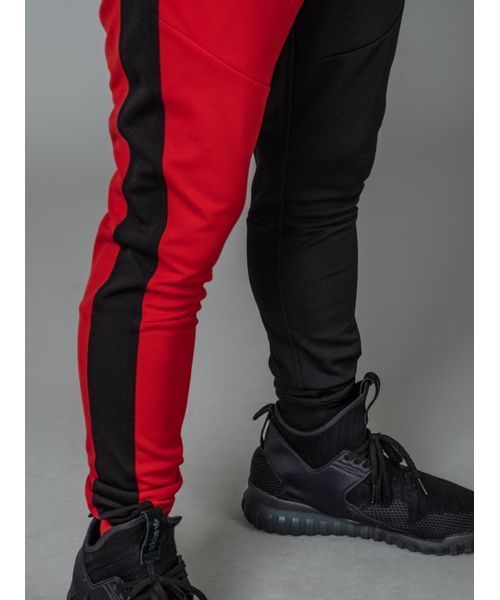 RE730（アールイーセブンサーティー）の「【RE730】左右配色切替えトラックパンツ  切り替えジャージサイドライン　ユニセックス（その他パンツ・メンズ・ブラック×ホワイト/ブラック×レッド・MEDIUM/LARGE/SMALL）」の12枚目の写真