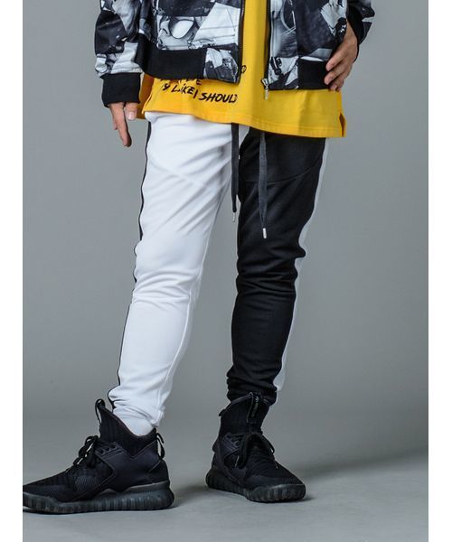 RE730（アールイーセブンサーティー）の「【RE730】左右配色切替えトラックパンツ  切り替えジャージサイドライン　ユニセックス（その他パンツ・メンズ・ブラック×ホワイト/ブラック×レッド・MEDIUM/LARGE/SMALL）」の15枚目の写真