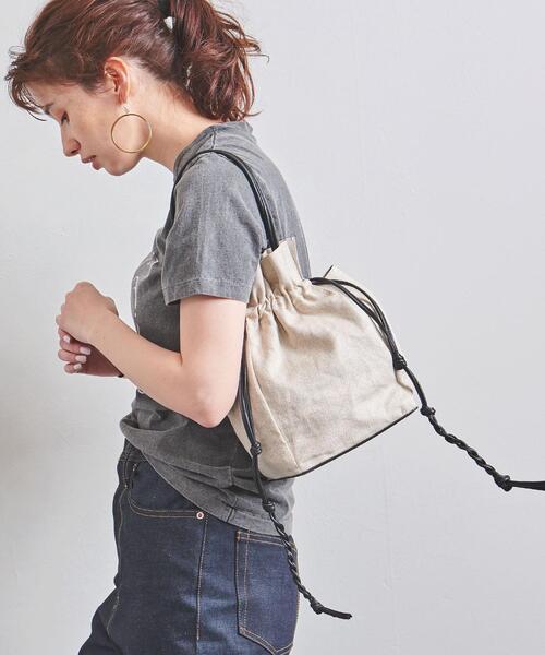 JAMIRAY（ジャミレイ）の「＜JAMIRAY（ジャミレイ）＞LTH/LIN ドローストリング バッグ（ハンドバッグ・レディース・ブラック/ホワイト・FREE）」の2枚目の写真