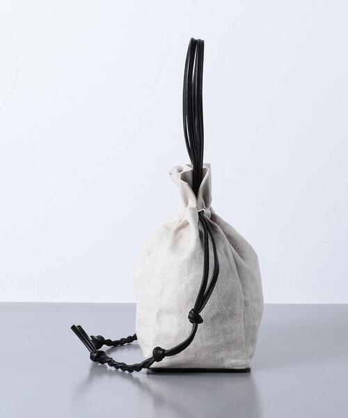 JAMIRAY（ジャミレイ）の「＜JAMIRAY（ジャミレイ）＞LTH/LIN ドローストリング バッグ（ハンドバッグ・レディース・ブラック/ホワイト・FREE）」の11枚目の写真