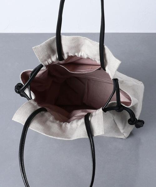 JAMIRAY（ジャミレイ）の「＜JAMIRAY（ジャミレイ）＞LTH/LIN ドローストリング バッグ（ハンドバッグ・レディース・ブラック/ホワイト・FREE）」の5枚目の写真