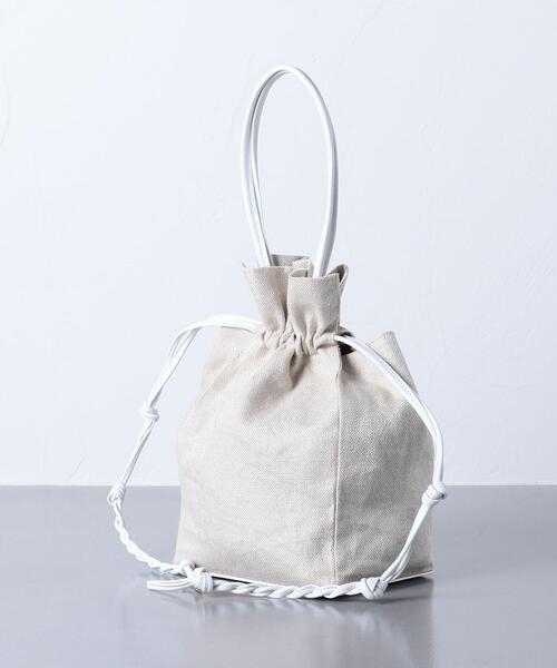JAMIRAY（ジャミレイ）の「＜JAMIRAY（ジャミレイ）＞LTH/LIN ドローストリング バッグ（ハンドバッグ・レディース・ブラック/ホワイト・FREE）」の3枚目の写真
