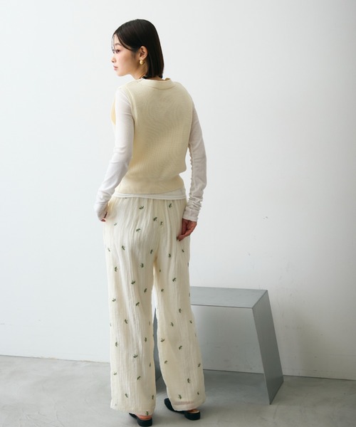 Trish（トリッシュ）の「メタル釦コンパクトベスト（ベスト・レディース・ブラック/アイボリー・FREE）」の4枚目の写真