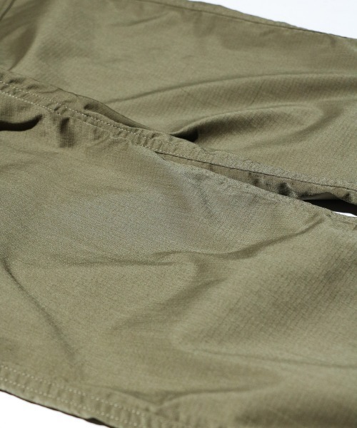 NANGA(ナンガ)の「NANGA / ナンガ HINOC RIPSTOP FIELD PANTS ヒノック リップストップ フィールドパンツ(その他パンツ・メンズ・ブラック/エメラルド・MEDIUM/LARGE/X-LARGE)」の21枚目の写真
