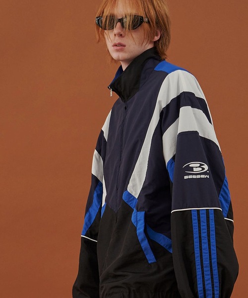 SeeSew(シーソー)の「【UNISEX】SPORTS ICON NYLON JACKET/スポーツアイコンナイロンジャケット(ブルゾン・メンズ・ブラック/ネイビー・M/L)」の11枚目の写真