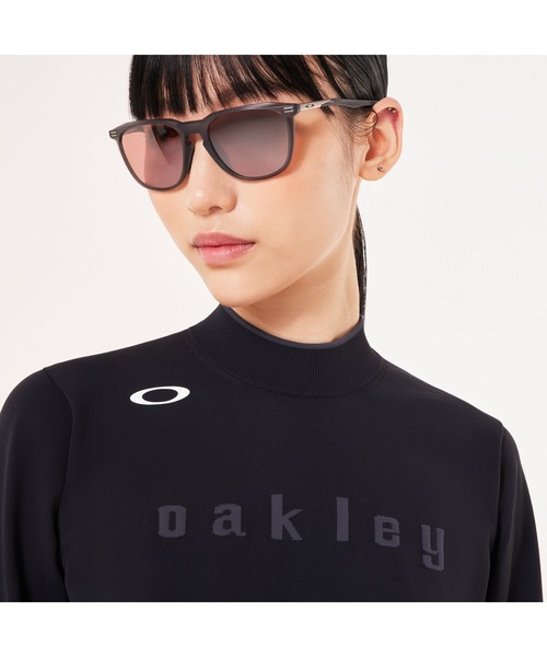 OAKLEY(オークリー)の「オークリーELEVATE LS SWEATER MOCK SHIRT/ゴルフ/モックネックシャツ/ゴルフシャツ/セーター/レディース/OAKLEY(その他トップス・レディース・ネイビー/ブルー系その他/ホワイト/ブラック・L/M/XS/S)」の1枚目の写真