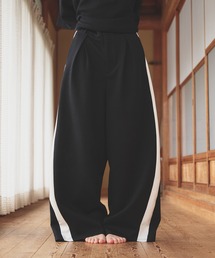 狐独（コドク）の「カーブライントラックパンツ（その他パンツ）」