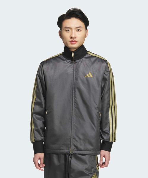 adidas(アディダス)の「Stadium Gold レギュラーフィットクライマウォーム メッシュ裏地付きウーブン フルジップ ジャケット / ジャージ / アディダス adidas(ジャージ・メンズ・ブラック×ゴールド・MEDIUM/SMALL/LARGE/3XL/XX-LARGE/X-LARGE/X-SMALL)」の1枚目の写真