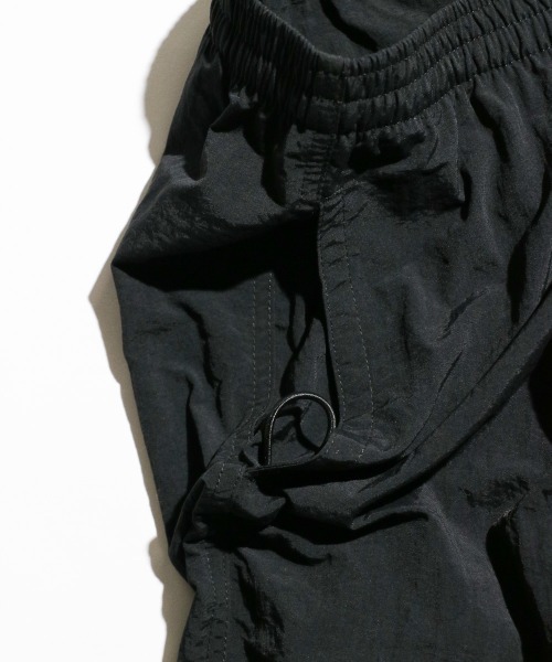 C.E.L.STORE(セルストア)の「GRKTINVESTIGATION / ガラクタ貿易 NYLON BAGGY SHORTS ナイロン バギーショーツ(その他パンツ・メンズ・マスタード/ライトグリーン/コーラルピンク/グレー/ブラック・SMALL/LARGE/MEDIUM)」の11枚目の写真