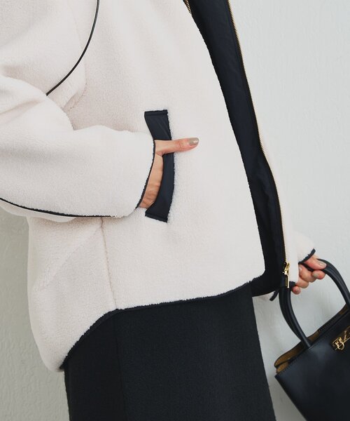 un dix cors（アンディコール）の「《ラフな抜け感を演出》配色フードボアコート（ブルゾン・レディース・オフホワイト/チャコールグレー・FREE）」の8枚目の写真