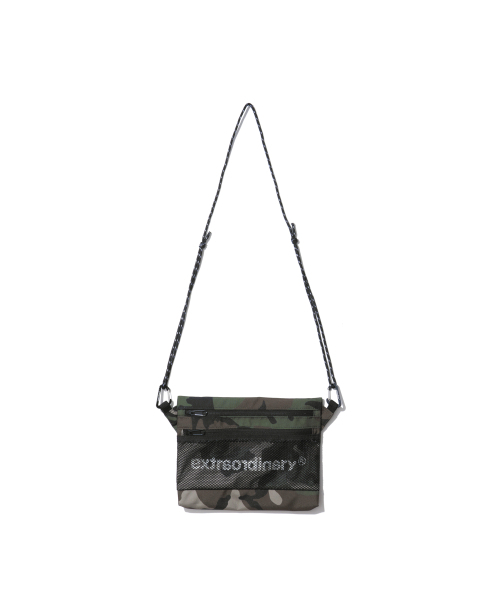 EXTRAORDINARY(エクストラオーディナリー)の「EX LOGO SACHOCHE WOODLAND CAMO(メッセンジャーバッグ・レディース・その他・ONE SIZE)」の1枚目の写真