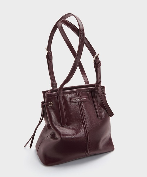 CHARLES & KEITH(チャールズ & キース)の「Noane ノアン イーロンゲイティド トートバッグ(トートバッグ・レディース・ワインレッド/スミクロ・S)」の12枚目の写真