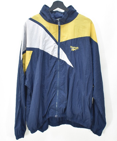 Reebok(リーボック)の「【ヴィンテージ古着】90's Reebok / リーボック ロゴデザイン フルジップ ナイロンジャケット(ナイロンジャケット・メンズ・ネイビー・LARGE)」の1枚目の写真