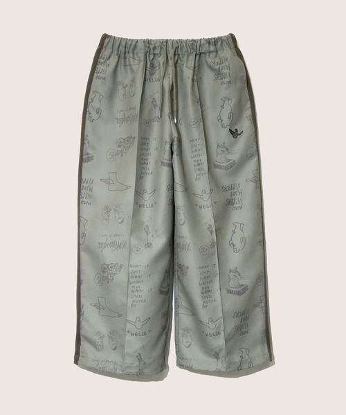 (What it isNt)ART BY MARKGONZALES(ワットイットイズント)の「(What it isNt)/ホワットイットイズント ART BY MARKGONZALES TRACK PANTS(その他パンツ・メンズ・ベージュ・MEDIUM/LARGE)」の1枚目の写真