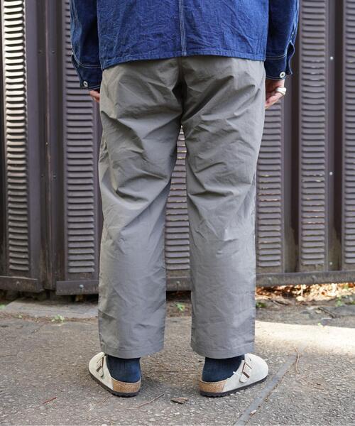 Gramicci（グラミチ）の「Gramicci/グラミチ　別注NYLON TUCK PANTS　別注ナイロンタックパンツ（その他パンツ・メンズ・ブラック/ブラウン/オリーブ/オリーブ系・S/M/L/XL）」の17枚目の写真