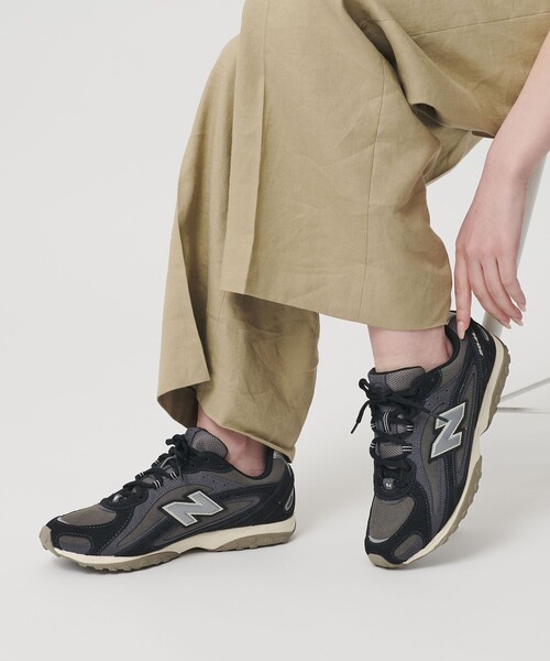 NEW BALANCE(ニューバランス)の「<New Balance>スエード U204L スニーカー(スニーカー・レディース・ブラック/ライトグレー・24cm/23cm/25cm/22.5cm/24.5cm/23.5cm)」の1枚目の写真