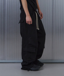 9999ARCHIVE（9999アーカイブ）の「Oblique Pocket Wide Cargo Sweat Pants（スウェットパンツ）」