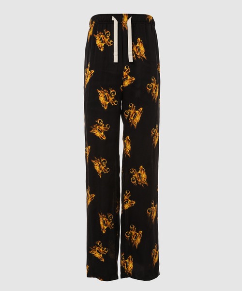 Palm Angels(パームエンジェルス)の「BURNING MONOGRAM LOOSE PANTS(その他パンツ・メンズ・ブラック×ゴールド・46)」の1枚目の写真