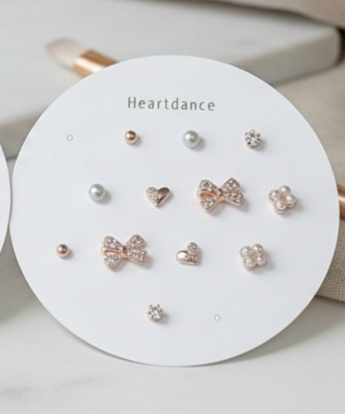 Heartdance(ハートダンス)の「ストーンリボン6ペアセットピアス(ピアス(両耳用)・レディース・ピンクゴールド/シルバー・FREE)」の1枚目の写真